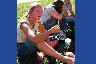 A Western Carolina University student smoker listening to free music beside the bell tower during an October 4, 2004 voter registration rally.
