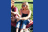 A Western Carolina University student smoker listening to free music beside the bell tower during an October 4, 2004 voter registration rally.