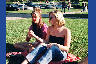 Two Western Carolina University students passing a cigarette during an October 4, 2004 voter registration rally offering free pizza and music.