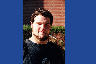 A Western Carolina University student smoker stops for a photo on October 4, 2004. He explained that the holder allows him to keep smoke further from his nose and eyes while typing with both hands.